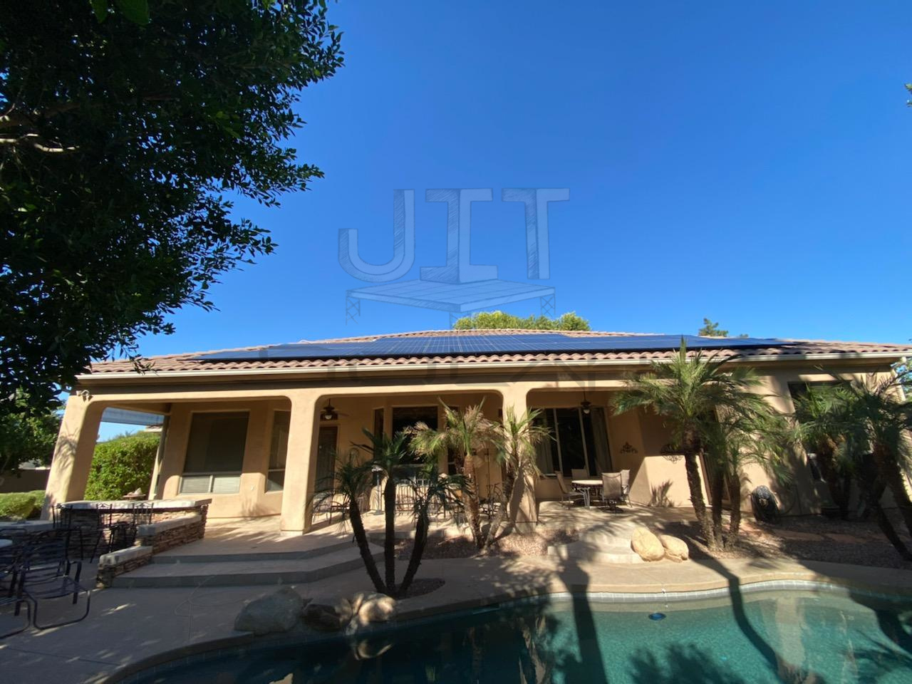 Picture of a house with a watermark out JIT